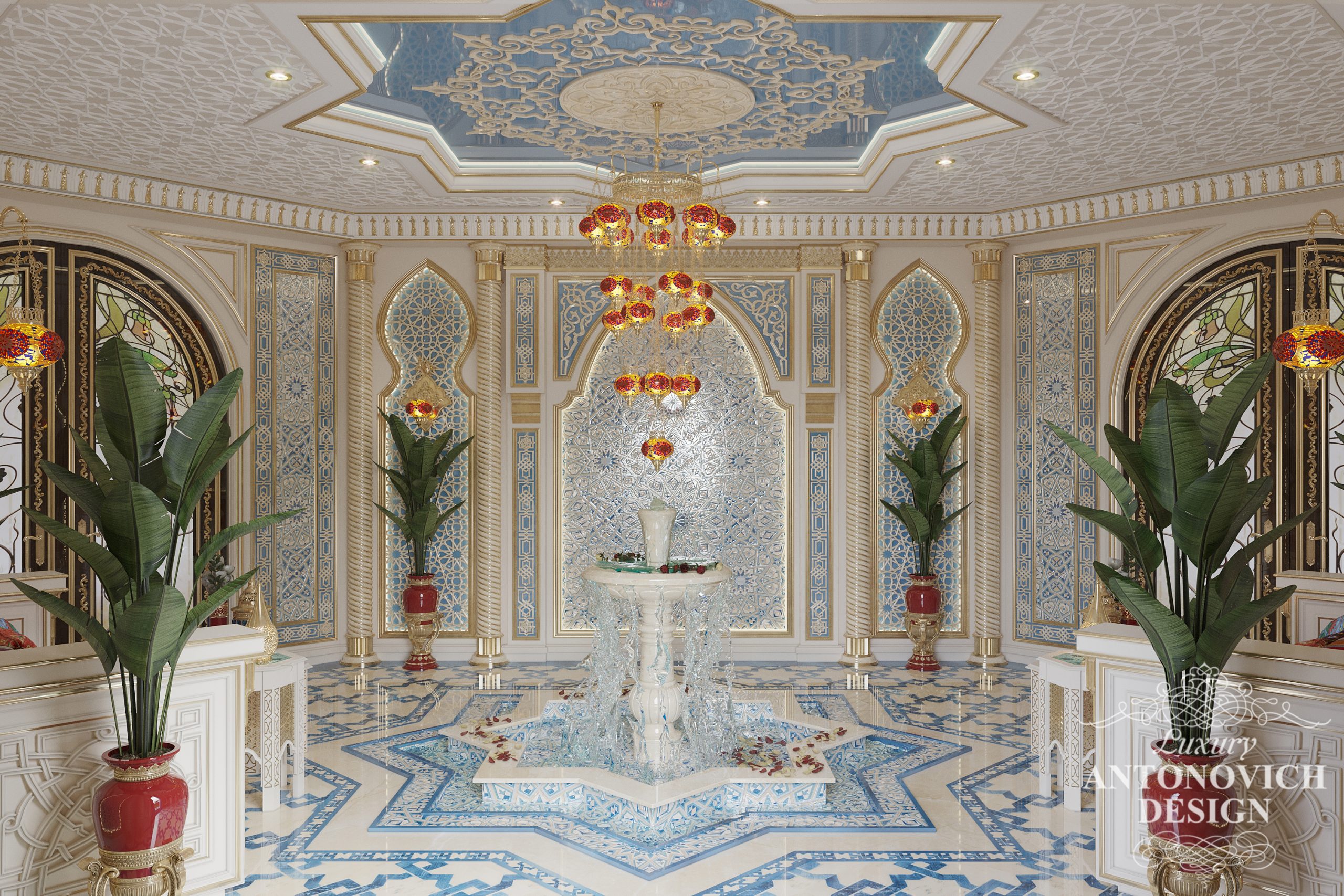 Вишуканий східний фонтан з мозаїкою синього і бірюзового відтінку декорований галькою в кімнаті відпочинку в східному стилі
