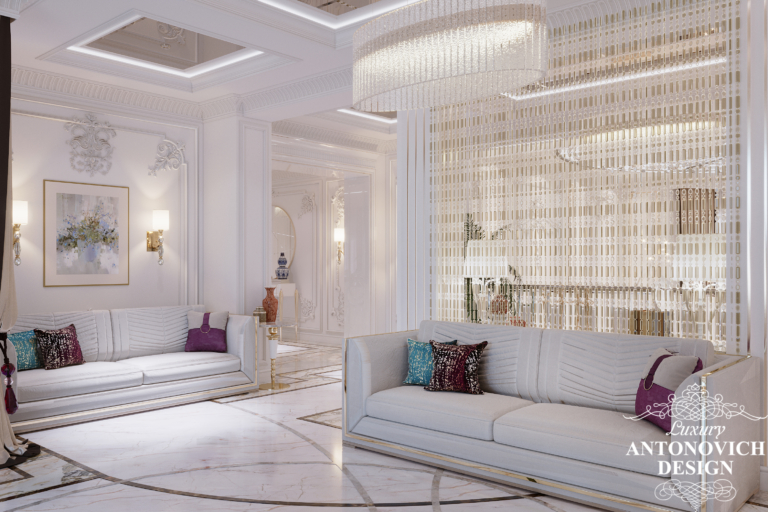 Дизайн приватного будинку у стилі сучасна класика з м'якими диванами.